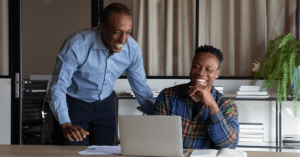 Mentor helping a mentee start a career in cybersecurity.